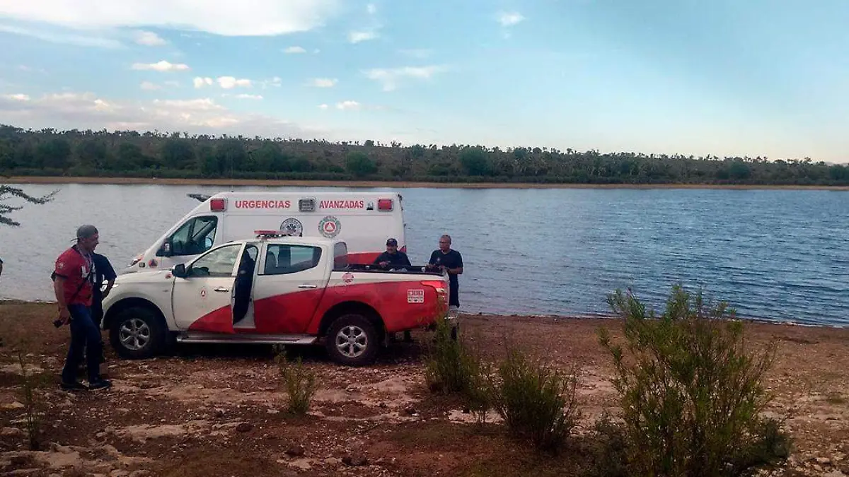 rescate de cuerpos en presa Los Álamos